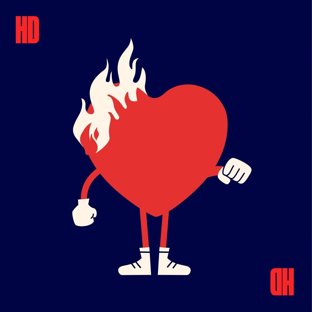 Heart Department brand mascot — a flaming red heart character with arms and legs standing defiantly on a deep navy field, framed by the HD wordmark in opposing corners.